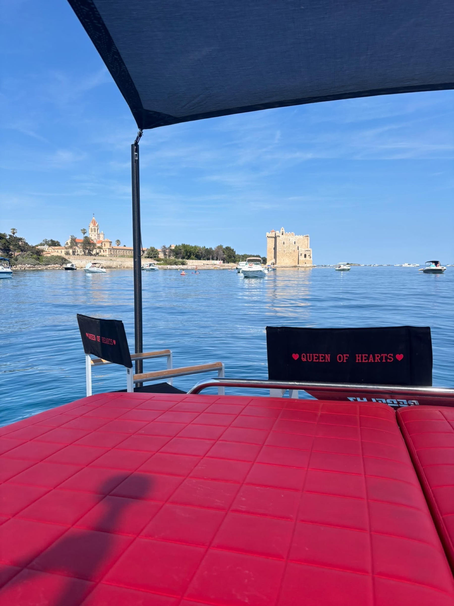 Queen of Hearts directors chairs looking out to the Lérins monastery
